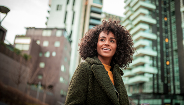 Person looking up and smiling