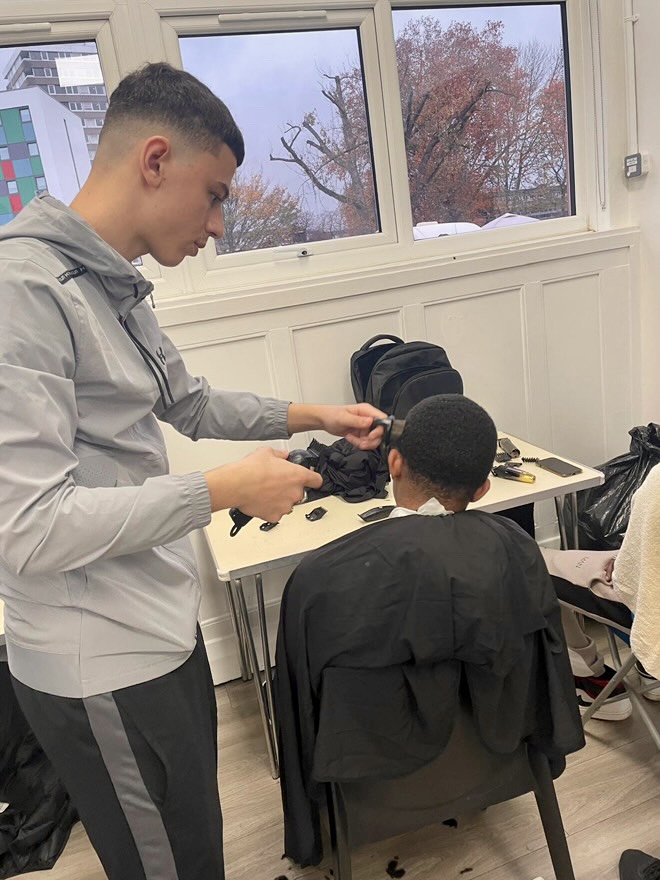 Hairdressing & Barbering Students Resume Community Volunteering at Queen Mary Hall