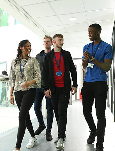 Students walking in corridor